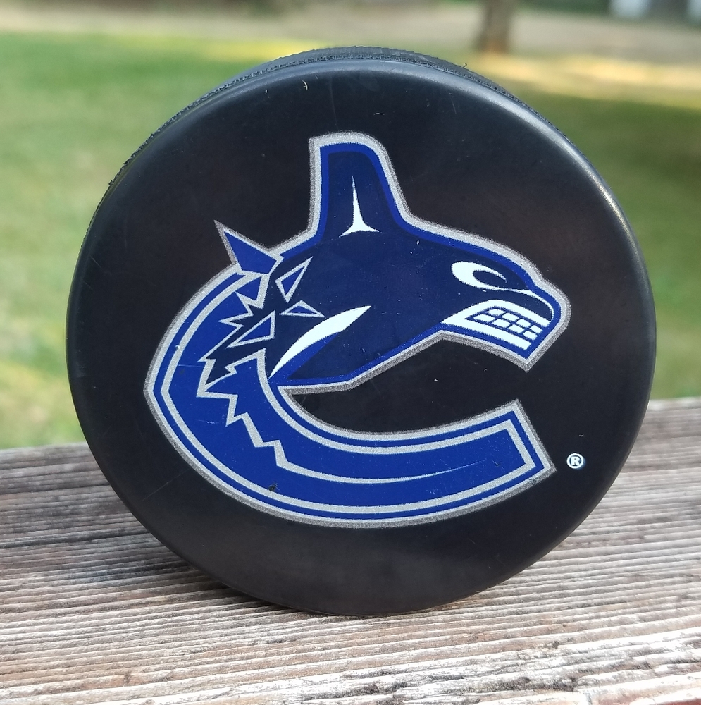 OLDER Vancouver Canucks NHL Hockey Puck